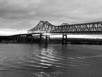 Bridge over sea against sky