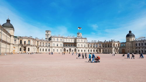 Group of people in front of historical building