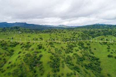 Windmills in upper cottonwood creek wildlife area near los banos. california. usa. mountains