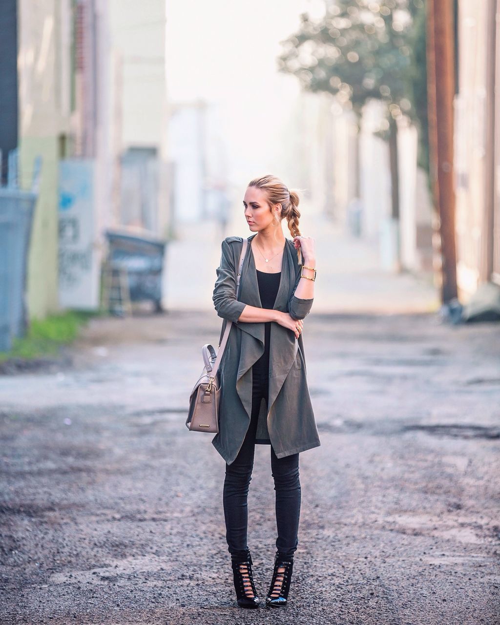 lifestyles, young adult, person, leisure activity, full length, casual clothing, young women, front view, focus on foreground, street, portrait, outdoors, looking at camera, confidence, day, the way forward, fashionable