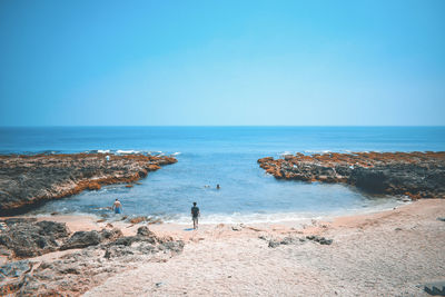 Scenic view of sea against clear sky