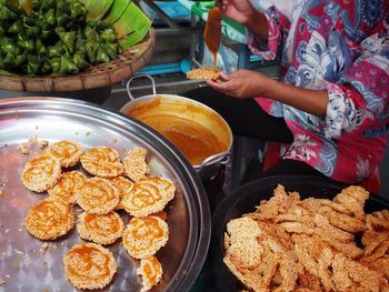 High angle view of man preparing food