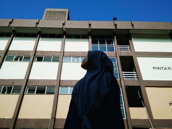 Low angle view of built structure against blue sky