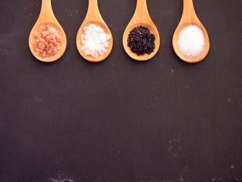 High angle view of food on table against black background