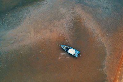 High angle view of boat moored at beach