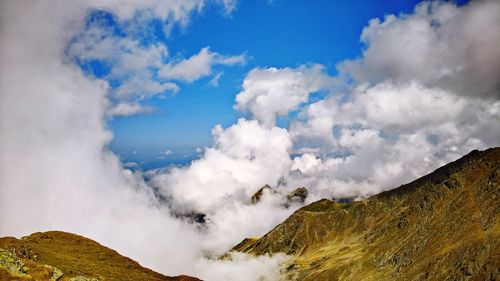 Panoramic view of volcanic landscape against sky