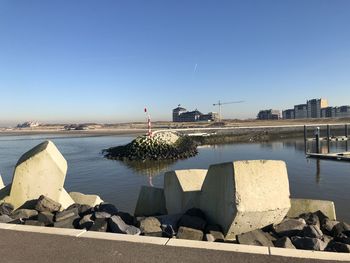 Scenic view of sea against clear blue sky