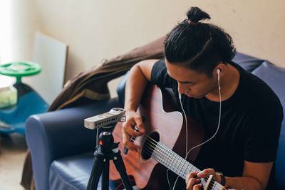 Woman playing guitar