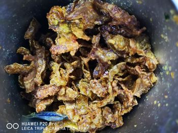 High angle view of meat in plate on table