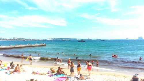 Tourists enjoying at beach