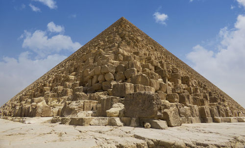 Low angle view of old ruins against sky