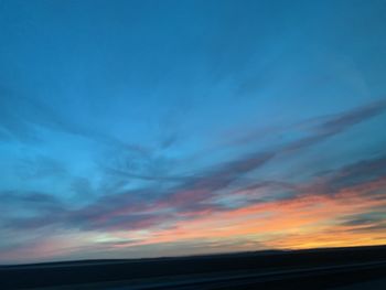 Scenic view of dramatic sky during sunset