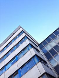 Low angle view of modern building against clear sky