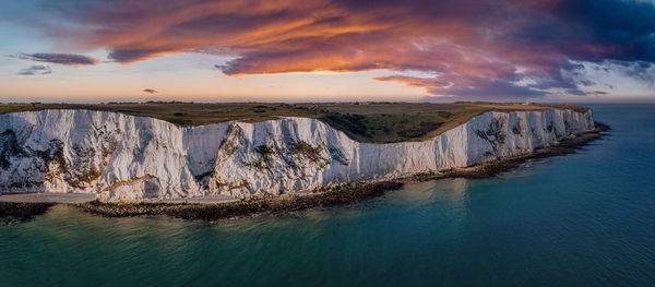 Aerial view of the white cliffs of dover. close up view of the cliffs from the sea side.