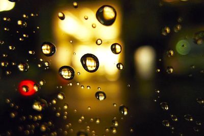 Close-up of water drops on glass