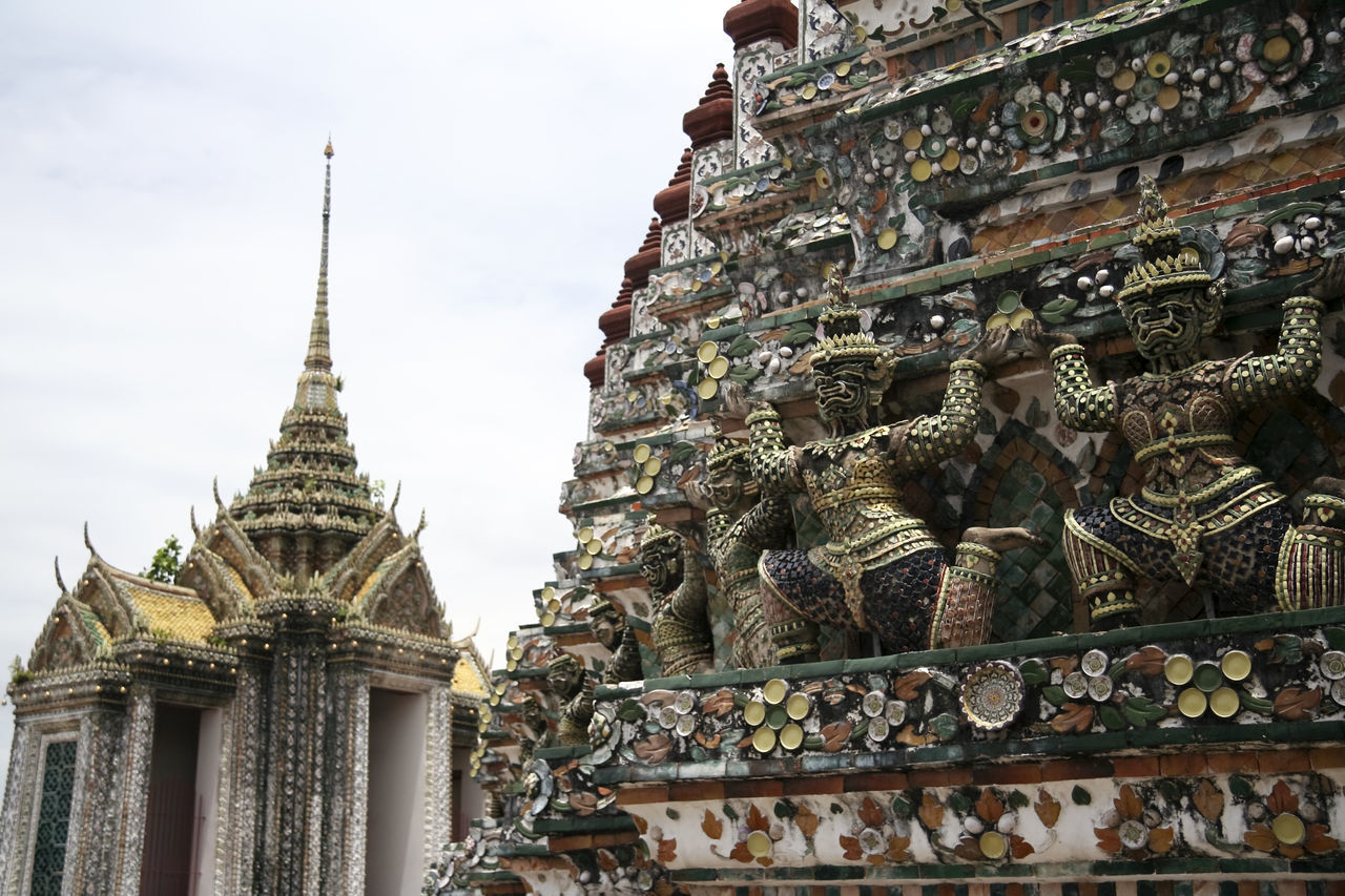 LOW ANGLE VIEW OF A STATUE OF A BUILDING