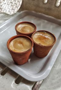 Close-up of ginger fresh kullad tea on table