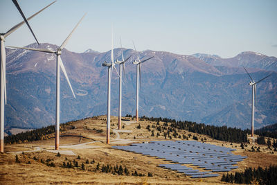 Wind farm and solar power station in lachtal during autumn