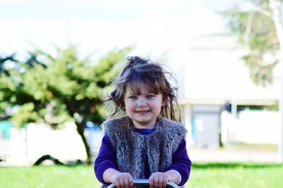 Portrait of cute girl outdoors