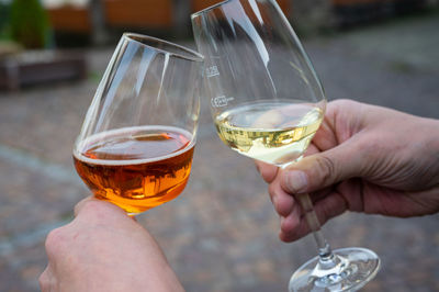 Close-up of hand holding wineglass