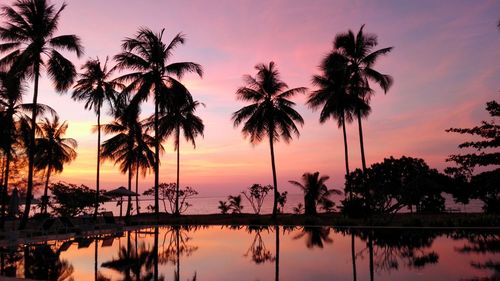 Scenic view of lake at sunset