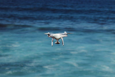 Drone flying over sea