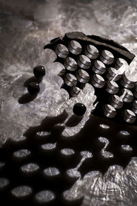 High angle view of coins on floor