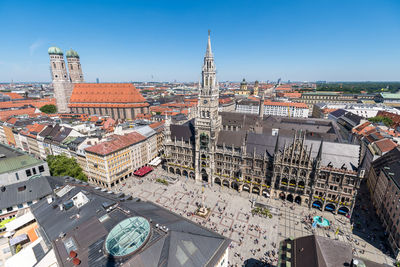 High angle view of city buildings against sky