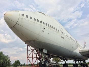 Low angle view of airplane against sky
