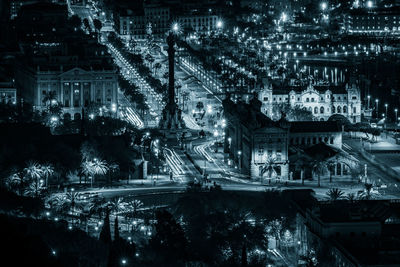 High angle view of city buildings at night