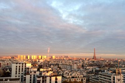 Cityscape against sky during sunset