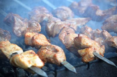 Close-up of meat on barbecue grill