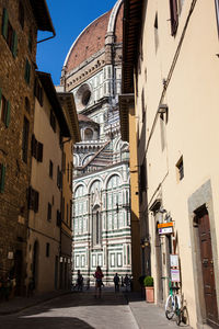 People on the beautiful streets around the florence cathedral