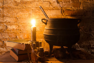 View of burning candles on wooden wall