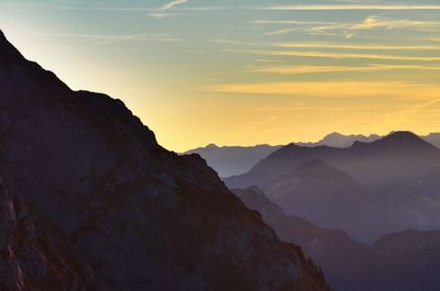 Scenic view of mountains against sky during sunset