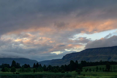 Scenic view of landscape against sky during sunset