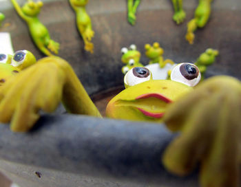 Close-up of yellow toy sculpture
