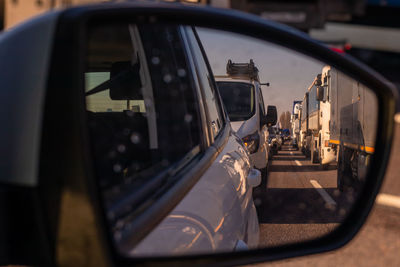 Reflection of car on side-view mirror