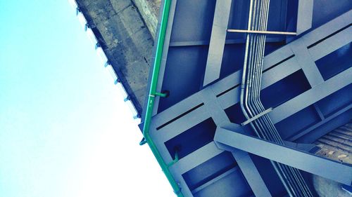 Low angle view of building against clear blue sky