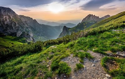 Scenic view of mountains against sky during sunset