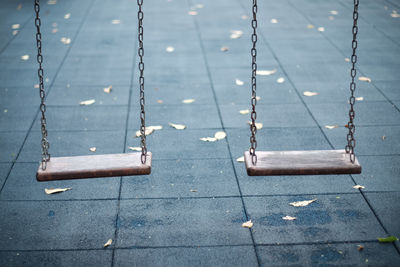 Close-up of swing at playground