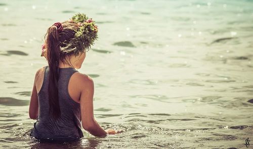 Female friends enjoying in sea