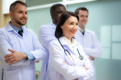 Portrait of doctor examining x-ray at clinic