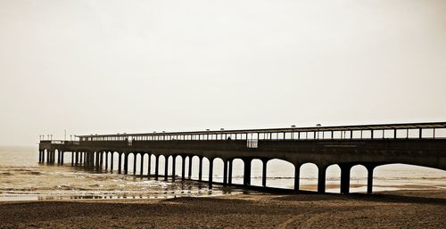 View of built structures against clear sky