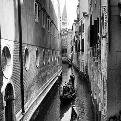 View of canal along buildings