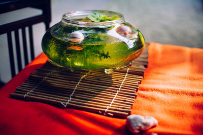 High angle view of fish bowl on table