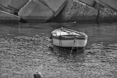 Boat moored on sea shore