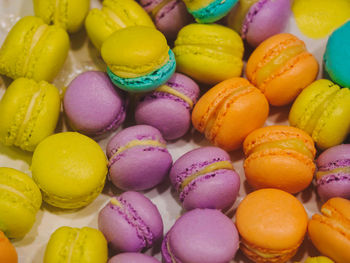 Full frame shot of colorful macaroons on table