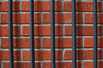 Full frame shot of red brick wall