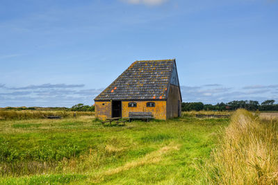 Texel, the netherlands, august 2021. autenthic barn for sheep on the isle of texel.